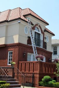 ladder leaning on the roof